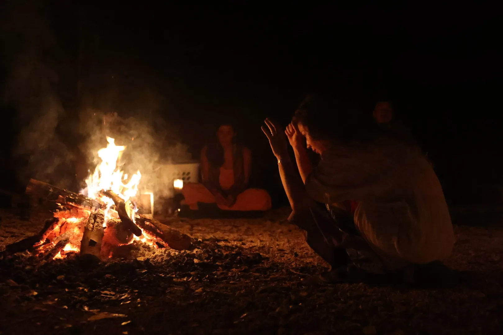 Traditional Wixárika ceremony — sacred fire at night